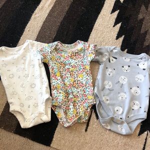 Newborn printed newborn bodysuits! Carters